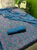 Premium Blue Bareeze Karandi 3-Piece Suit featuring intricate floral embroidery on shirt canvas with pure crinkle chiffon dupatta.