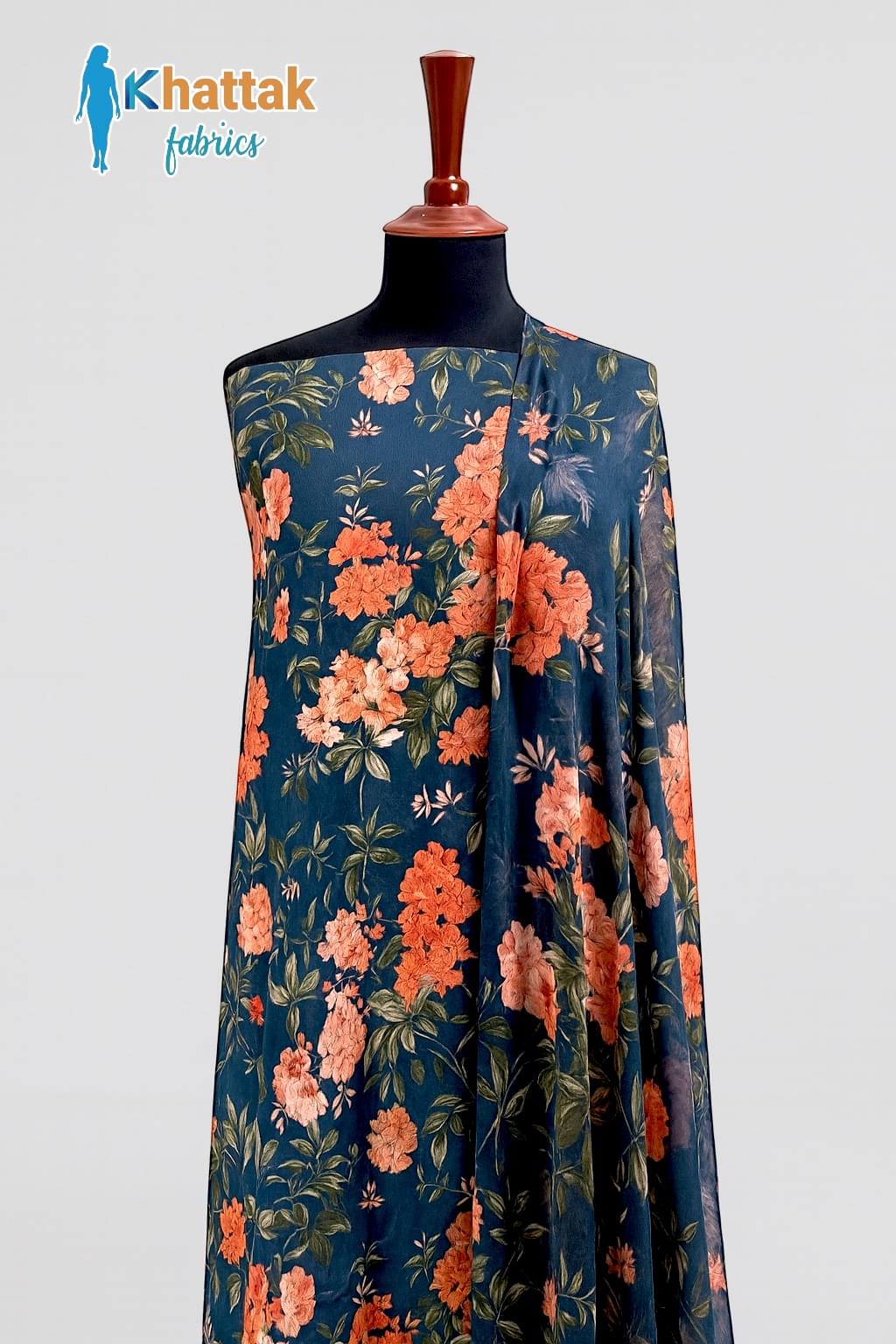 “Teal Blue Floral Khaddar 3PC Suit – Khattak Fabrics” “Teal blue floral printed khaddar suit with peach flowers – Khattak Fabrics”